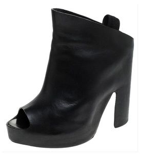 Balenciaga black open toe platform shoe.